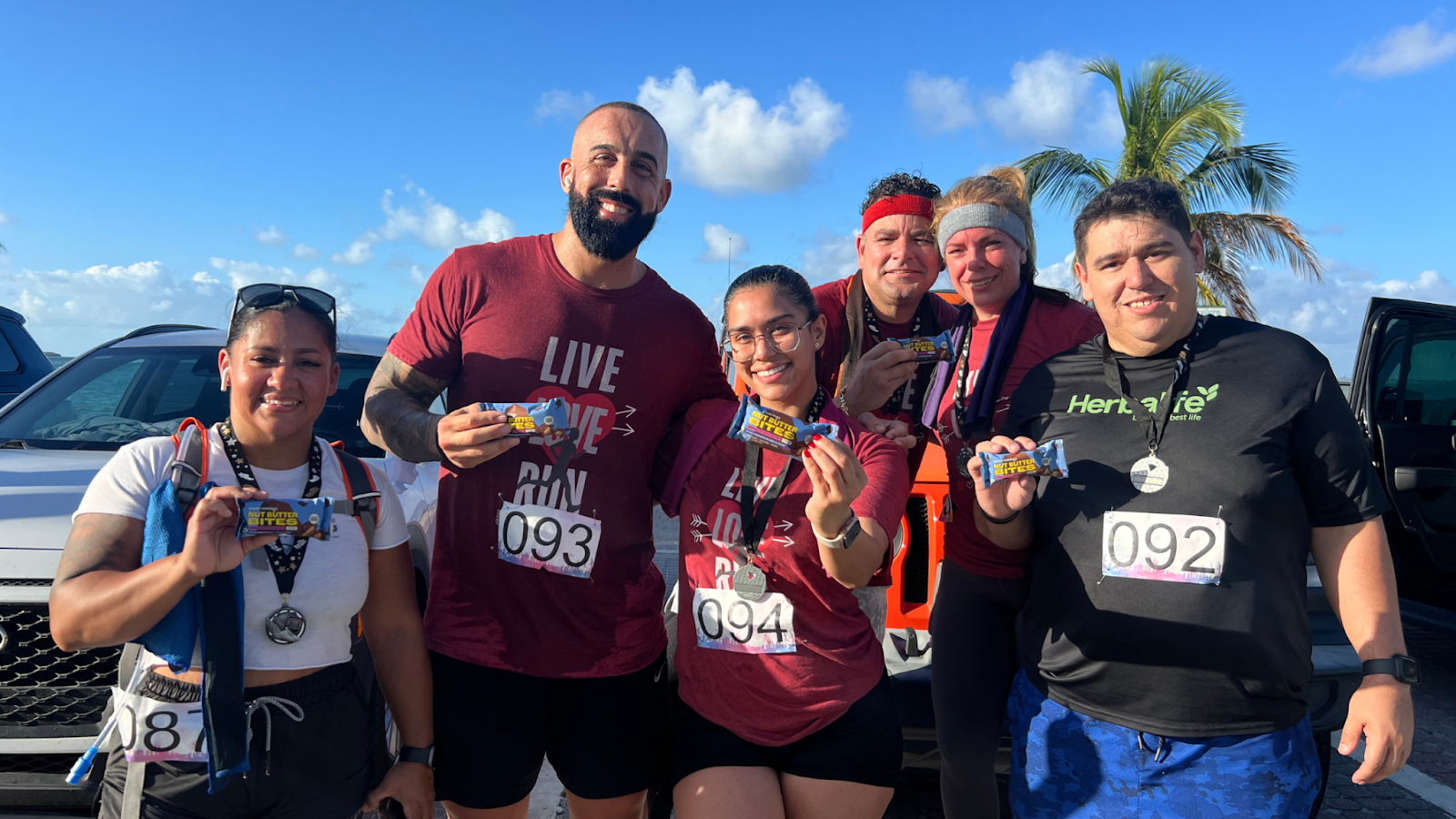 A group of happy runners after completing their race in Miami