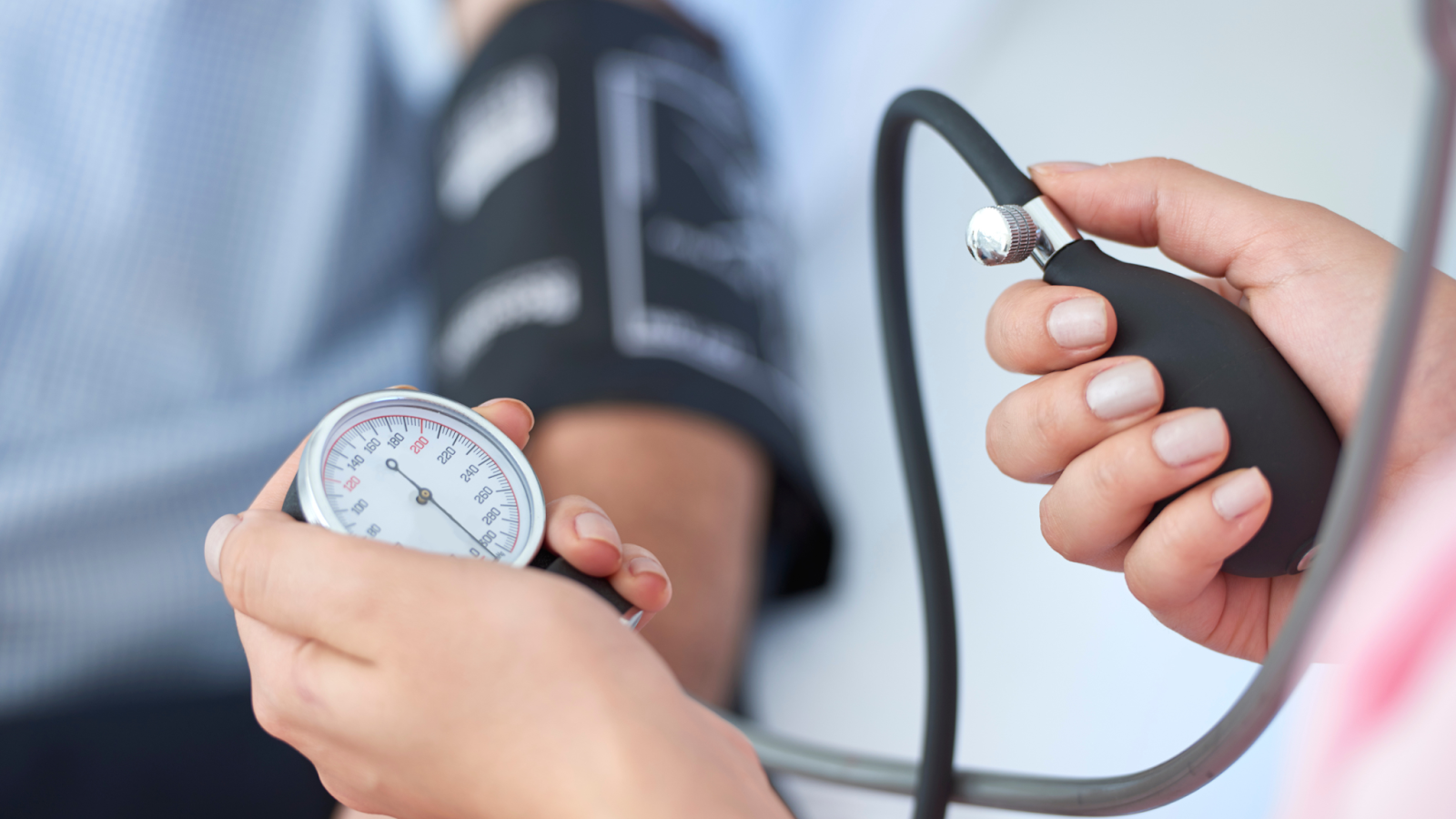 Person getting their blood pressure checked