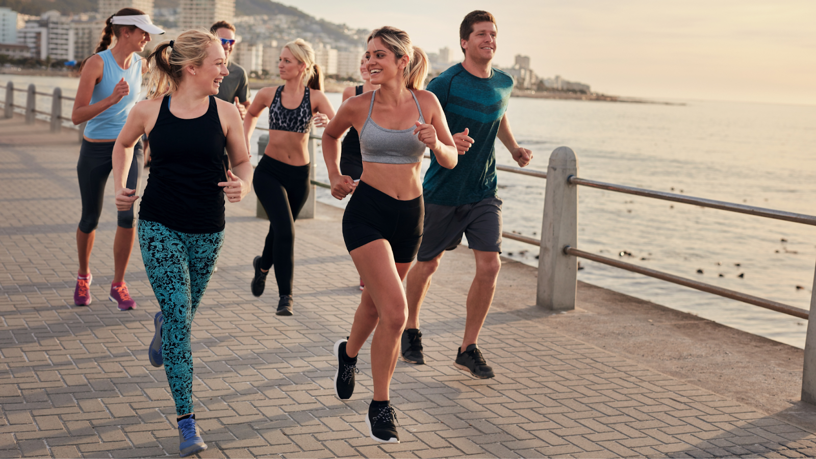 Group of people running and training together