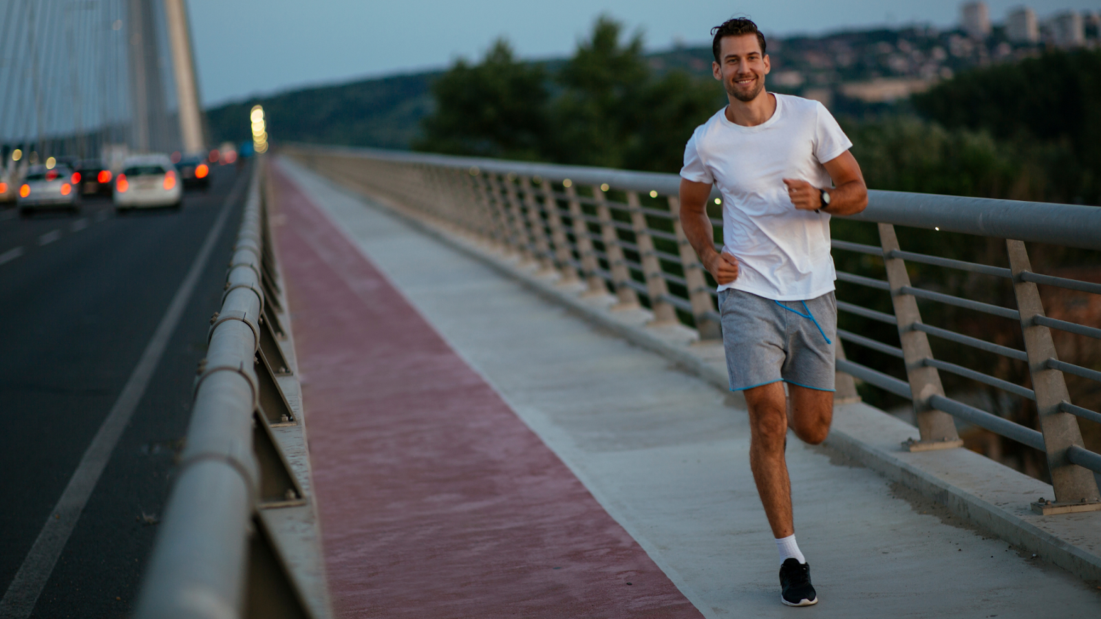 Happy man running with an easy run pace