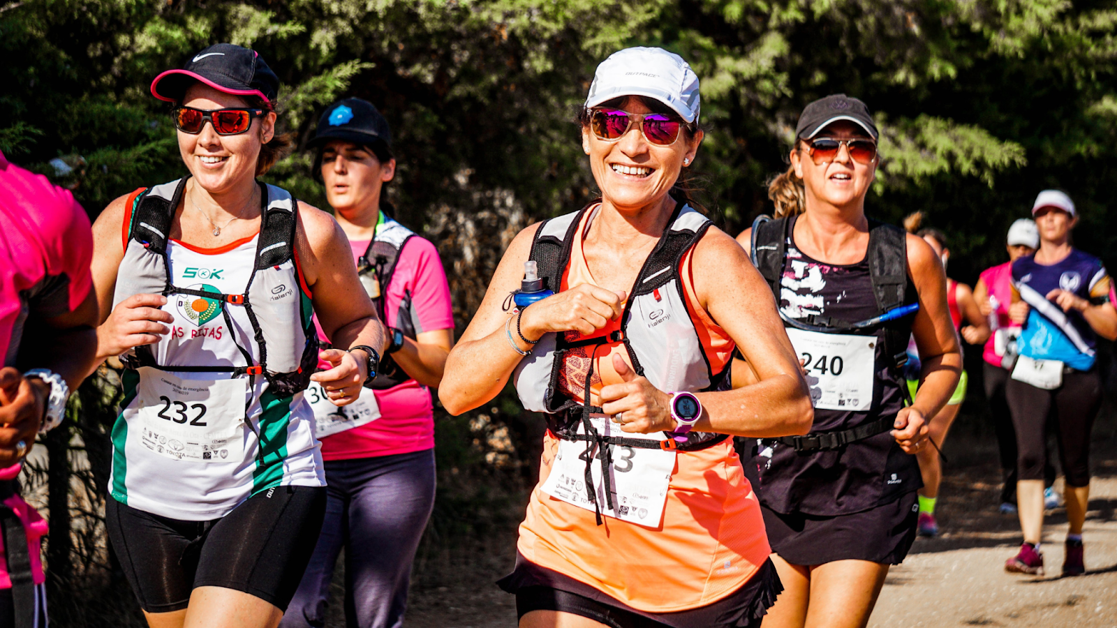 Group of women running a half marathon and marathon