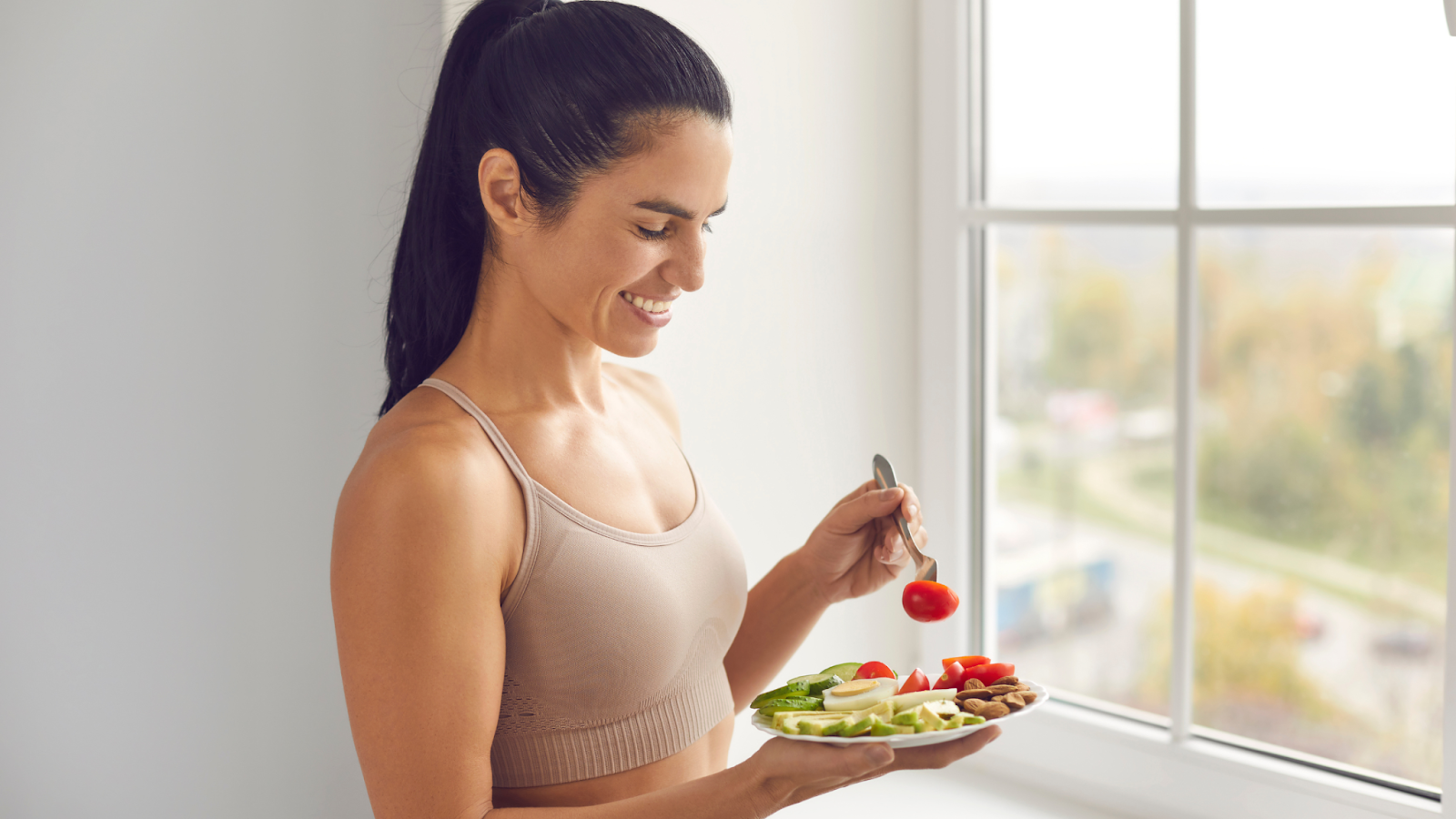 Woman eating a healthy meal before her run