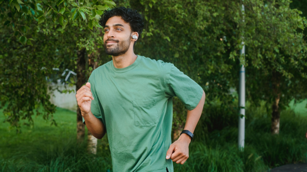 Happy man running a new green route