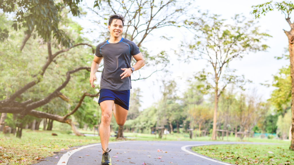 Man running outside in sports gear