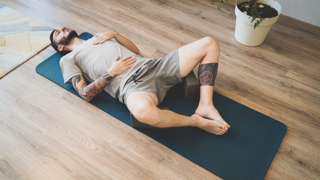 Man practicing diaphragmatic breathing