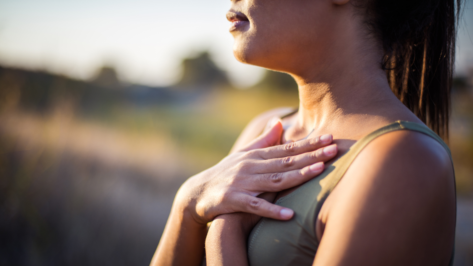 Woman focusing on her breathing during exercise to control her heart beat